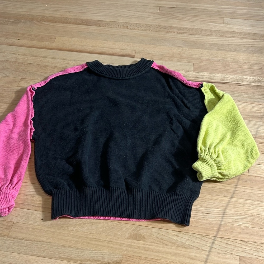 Pink and yellow sweater